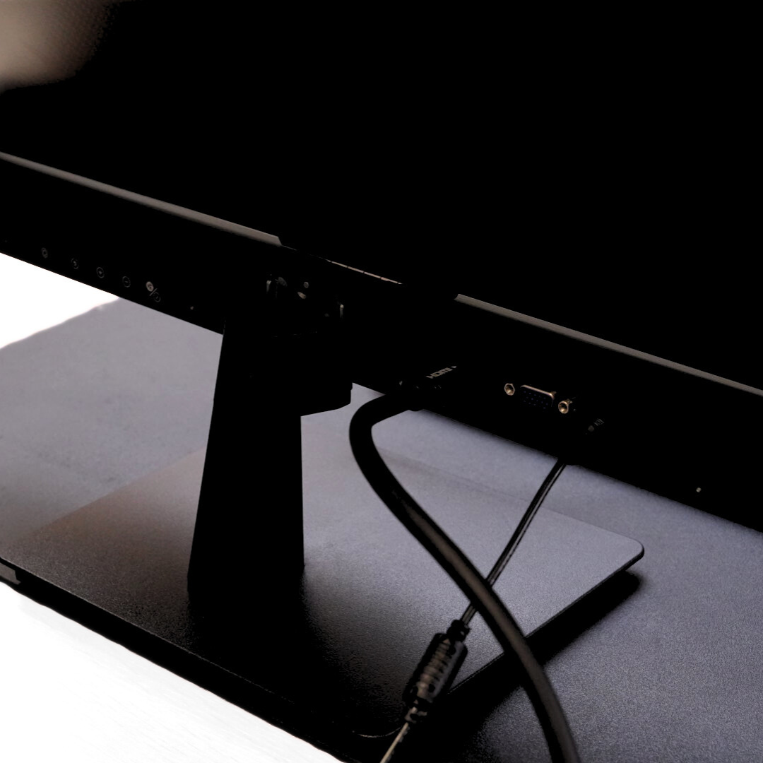 Close-up of Eazeye Monitor 1 backside ports while on desk, showing connectivity