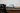 Radiant monitor on desk connected to laptop, mirroring screen with transflective LCD