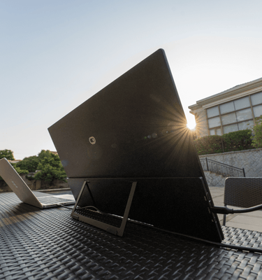 Eazeye Monitor 2.0 outdoors, showing the back design that eliminates the need for a reflective panel, thanks to its naturally frontlit RLCD technology.
