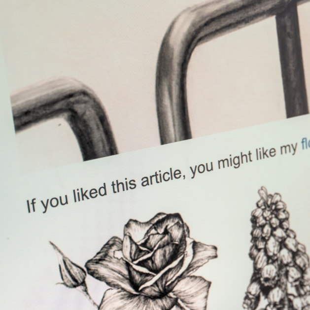 Close-up of Eazeye Monitor 1 screen displaying black-and-white ink plant illustration