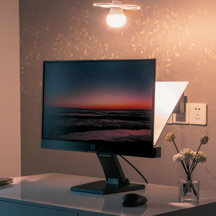 Eazeye Monitor 1 adapting to warm overhead light, naturally backlit display reacting to ambient light