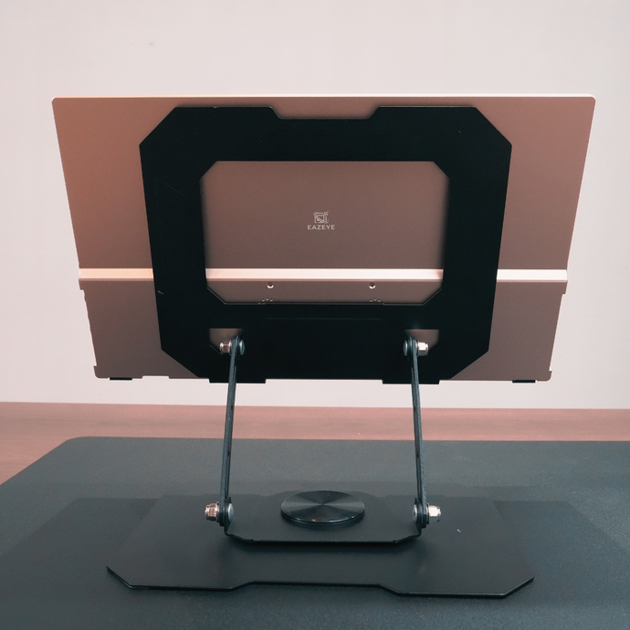 Back view of Radiant monitor mounted on Radiant Rise accessory, desk setup