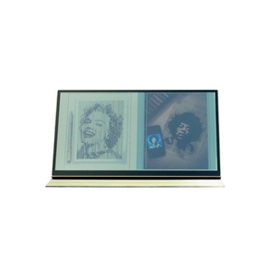 Front-angle of Radiant monitor displaying images to highlight paper-like qualities