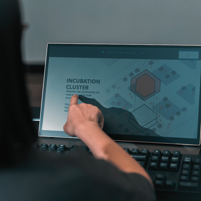 User casting a shadow on Radiant monitor to show paper-like reactivity to light