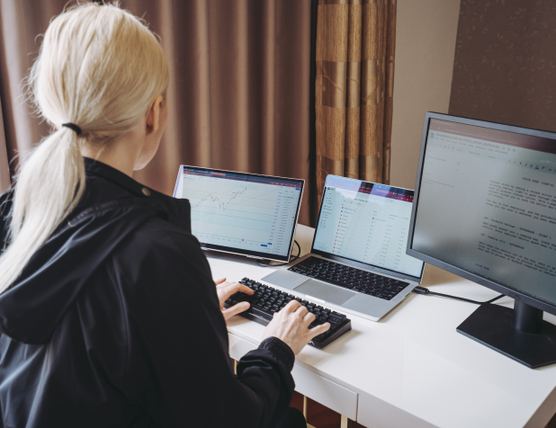 Woman working on the Radiant Monitor, benefiting from its glare-free display and comfortable viewing for extended hours.